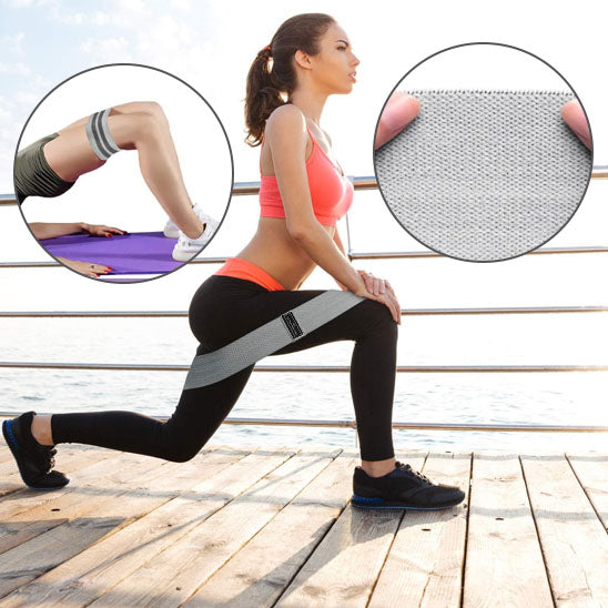 femme étire ces jambe et ces cuisse avec un élastique